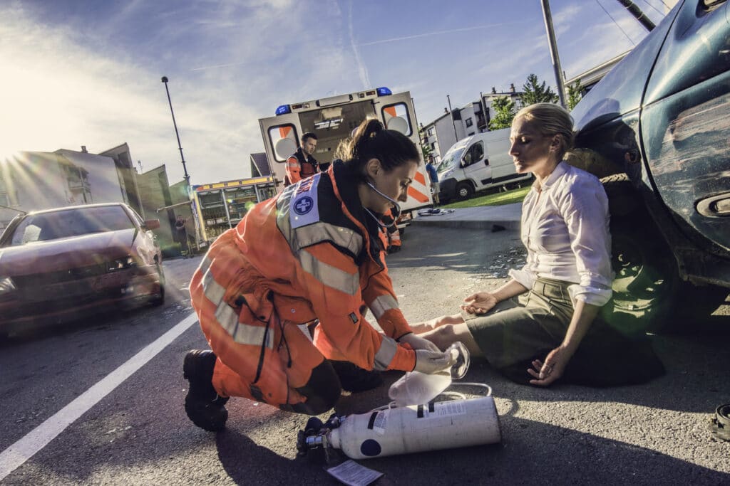 paramedics providing first aid