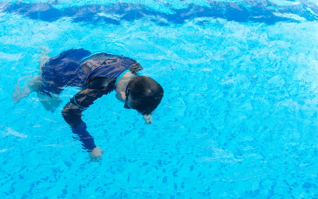 Boy Drowning in Pool 