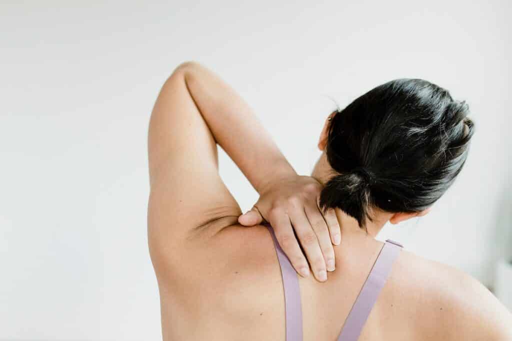 Woman with neck and shoulder pain.