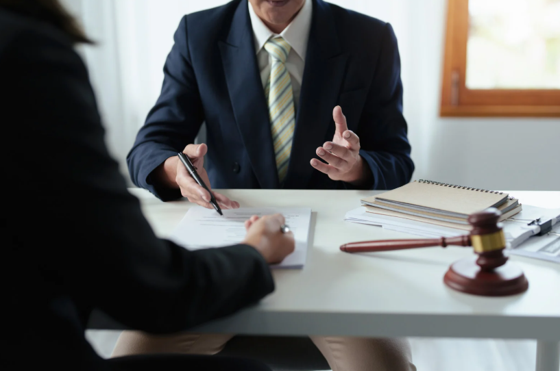 Legal consultation with documents and gavel